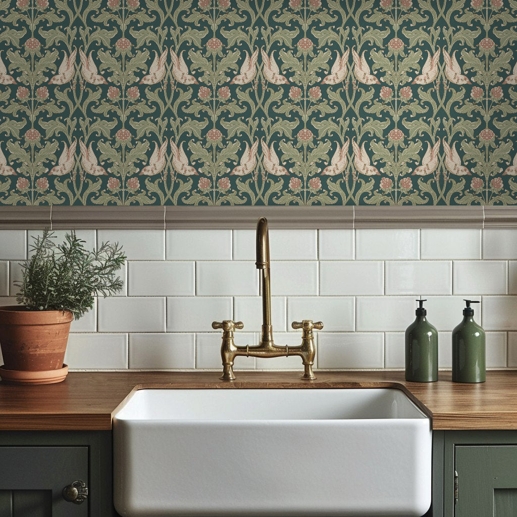 Kitchen with white sink, gold faucet, and patterned wallpaper