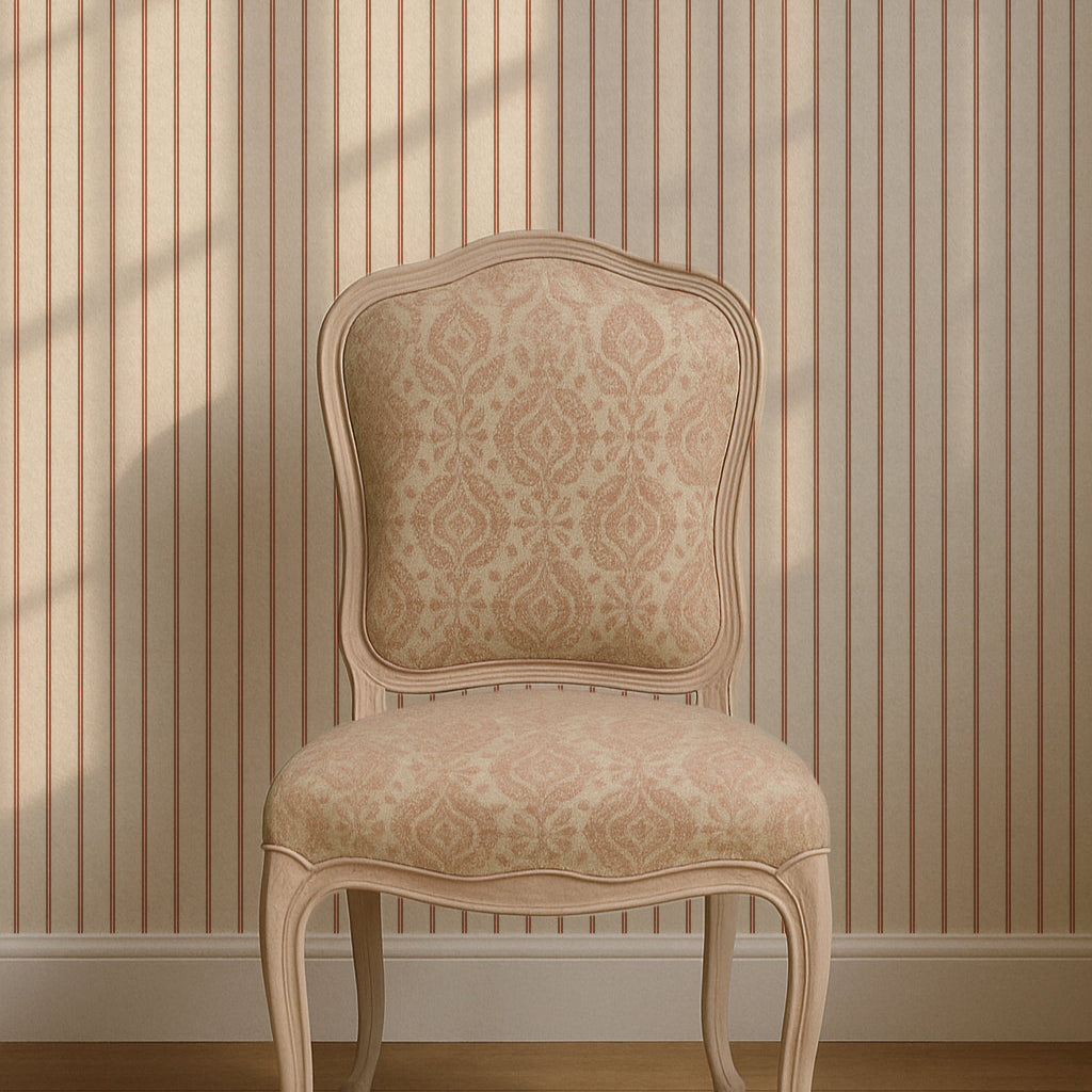Decorative chair with patterned backrest against a striped wall.